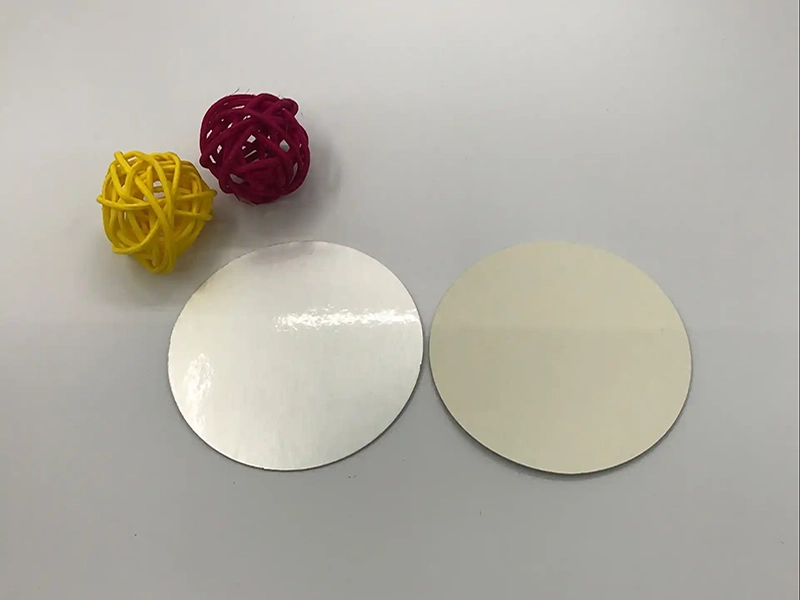 Two sides view aluminum foil induction seal liner, shiny foil side and paper backing side