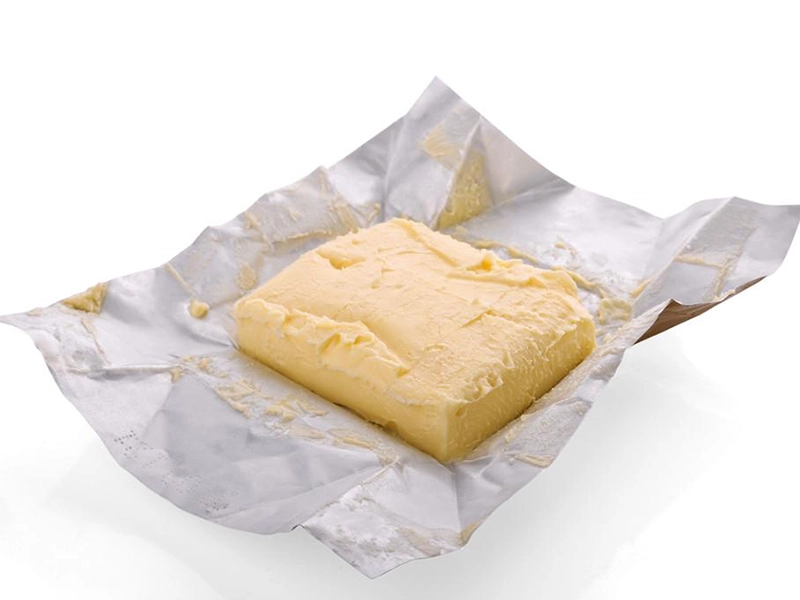 Aluminum foil supplied for butter wrapping and packaging applications, shown unfolded