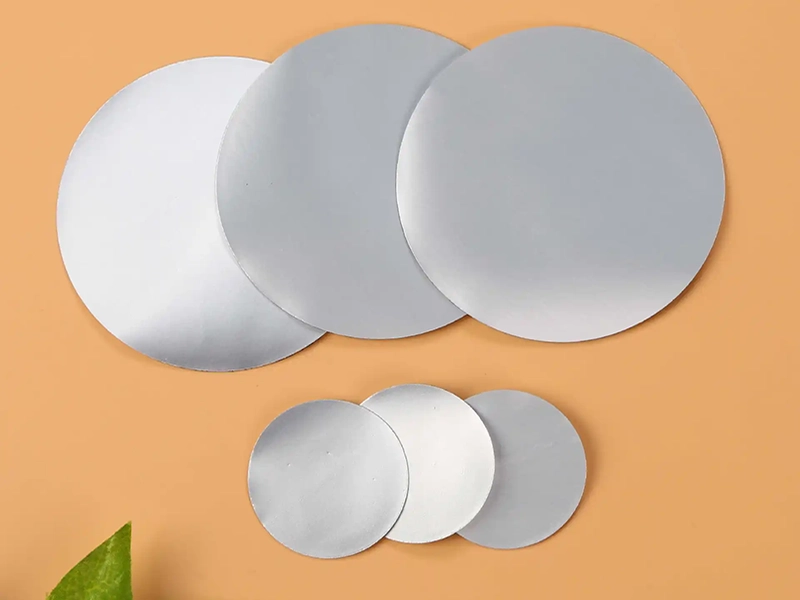 Multi size aluminum foil induction seal liner material, small and large round seal wads for containers