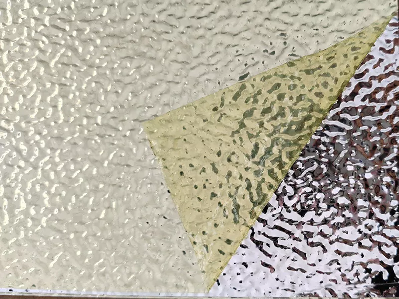 Orange peel embossed aluminium foil with a stucco textured finish