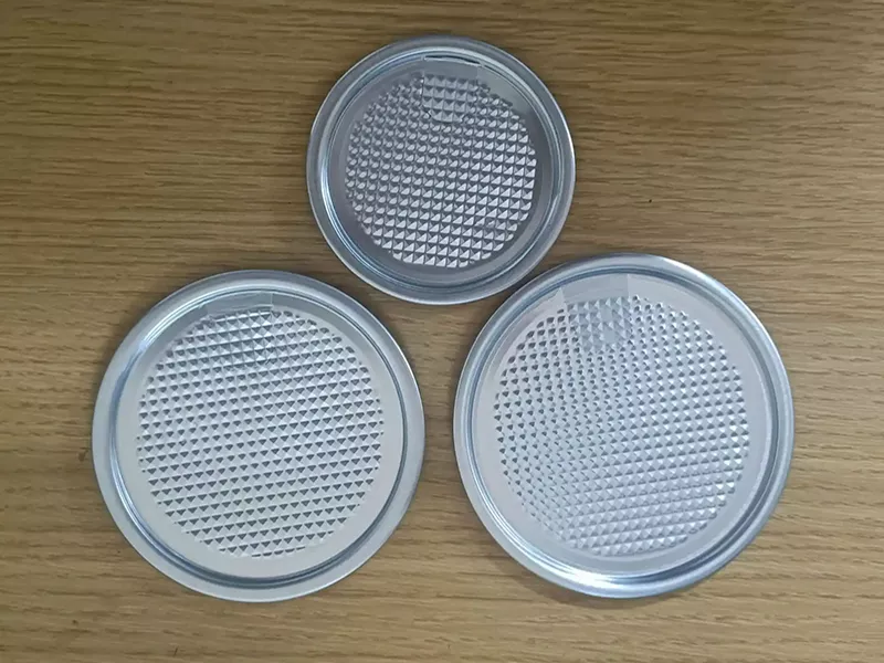 Silver aluminum peel-off end with a pull tab for retortable POE packaging