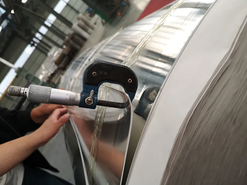 Thickness measurement of transformer aluminum strip